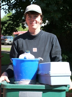 Volunteer ready to collect water quality samples.